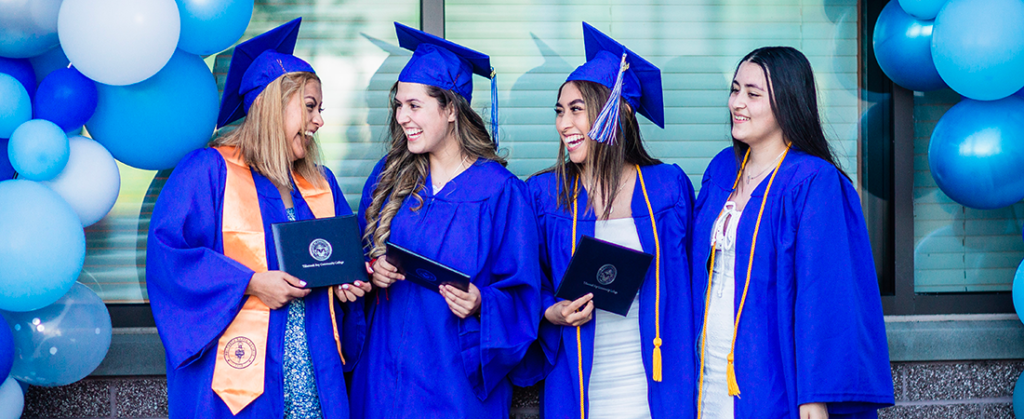 Four Woman Celebrating at Graduation